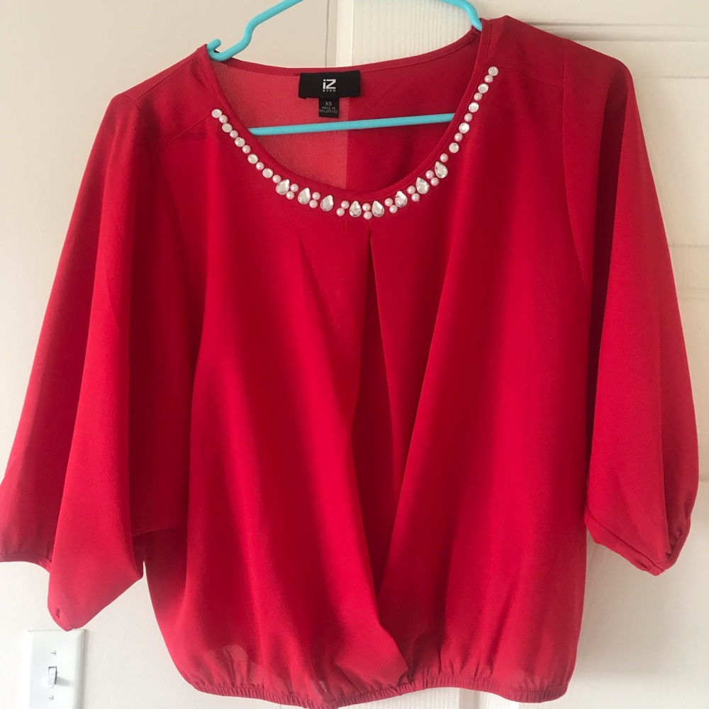 Stylish, beaded red blouse